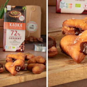 Beignets fourrés au chocolat posés sur une planche en bois